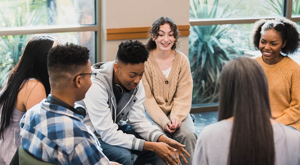 Informal group discussion among young people.