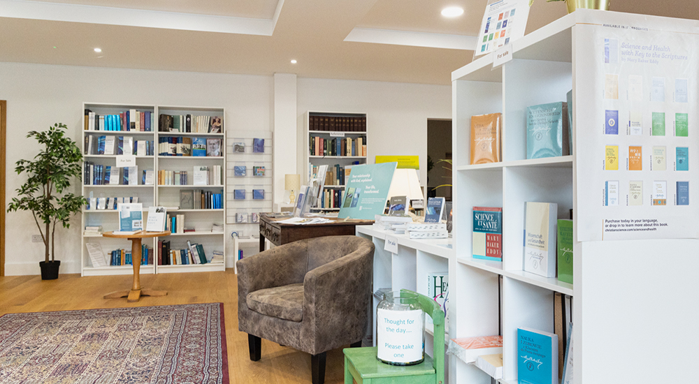 Reading Room with book displays and a chair for guests to study in.